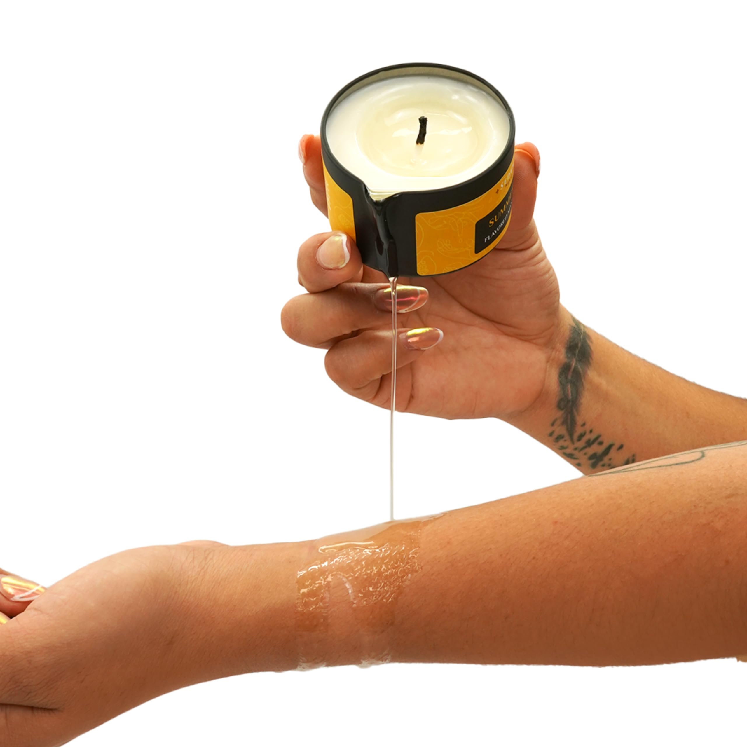 Warm melted massage oil poured onto skin for hydration