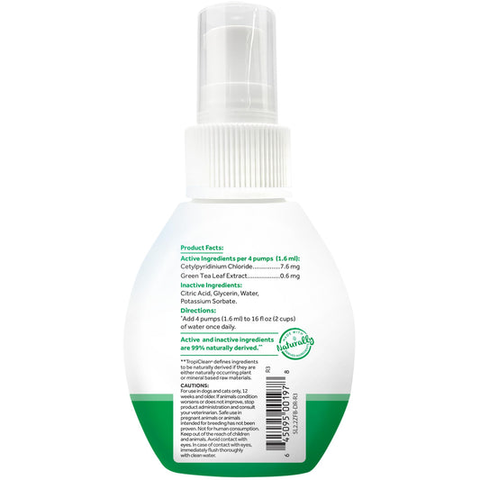 Pour TropiClean Fresh Breath Water Additive into a dog’s water bowl