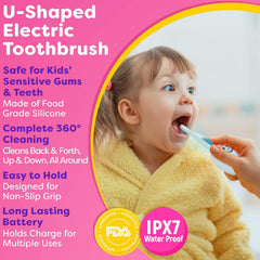 Kid holding Trueocity Unicorn Pink U-Shape Toothbrush