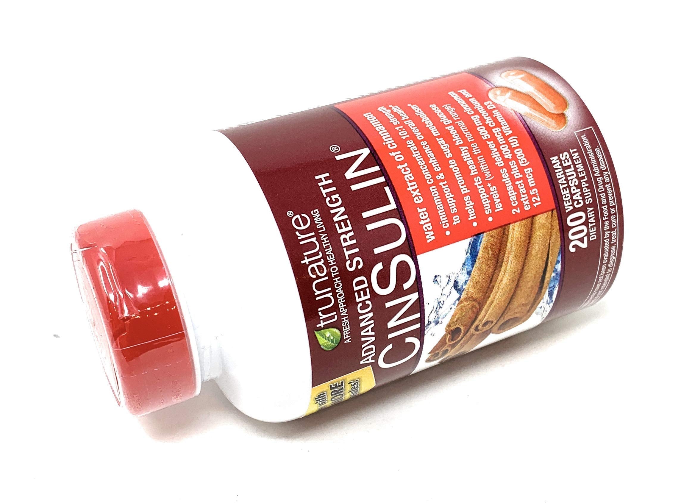 Two CinSulin 500 mg bottles with capsules visible