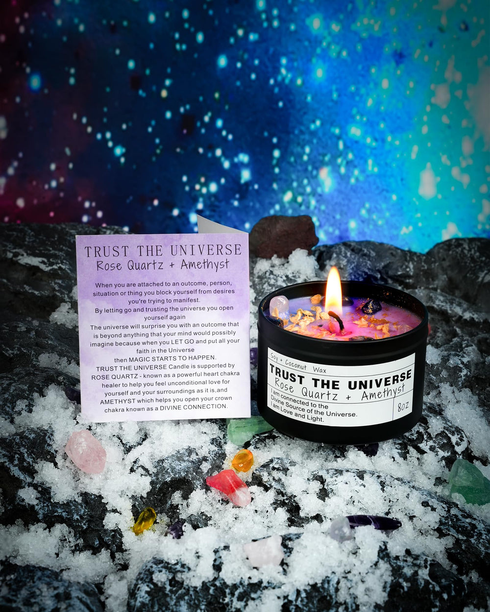 Candle surrounded by crystals cleansed with sacred wood