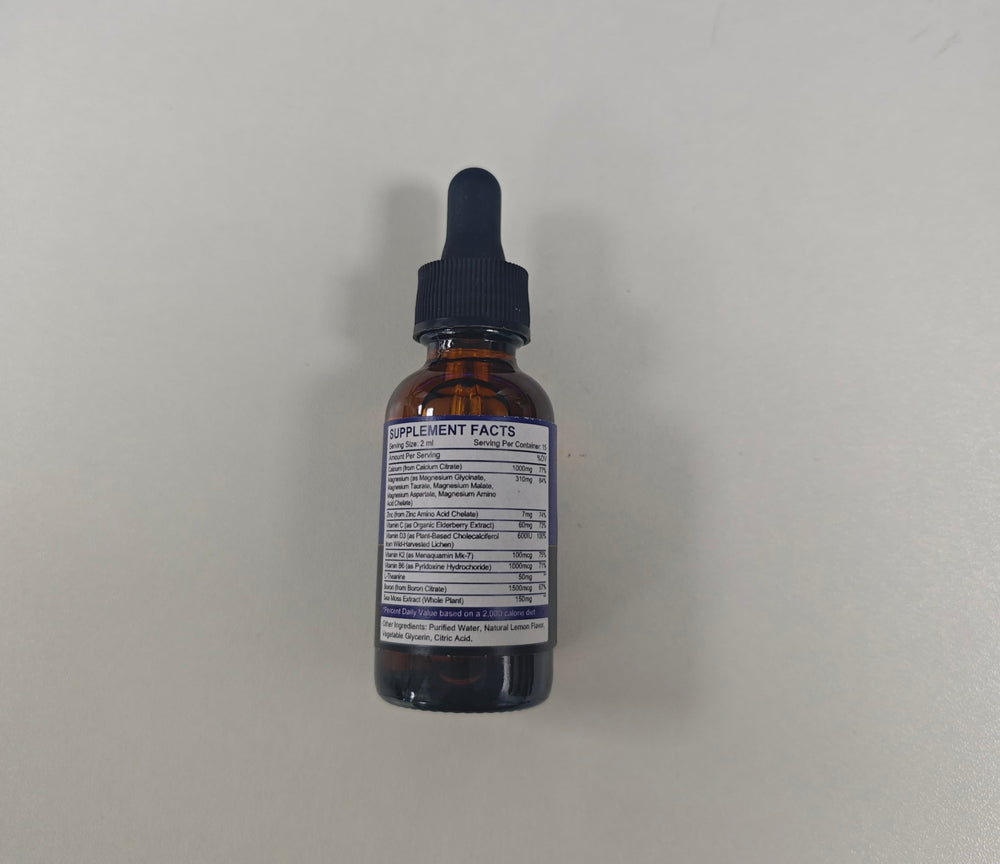 Side view of the two-pack calcium magnesium zinc liquid drops