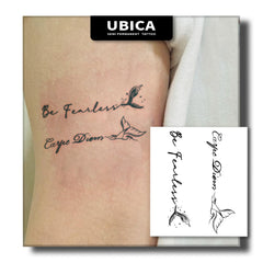 UBICA Be Fearless butterfly tattoo in ink-wash style for subtle daily motivation.