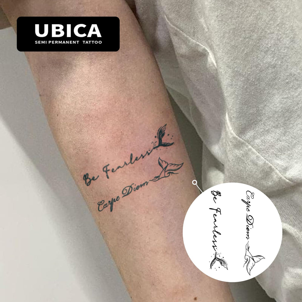 UBICA Carpe Diem fish tail tattoo with flowing lines for a graceful look.