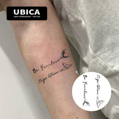 UBICA Carpe Diem fish tail tattoo with flowing lines for a graceful look.