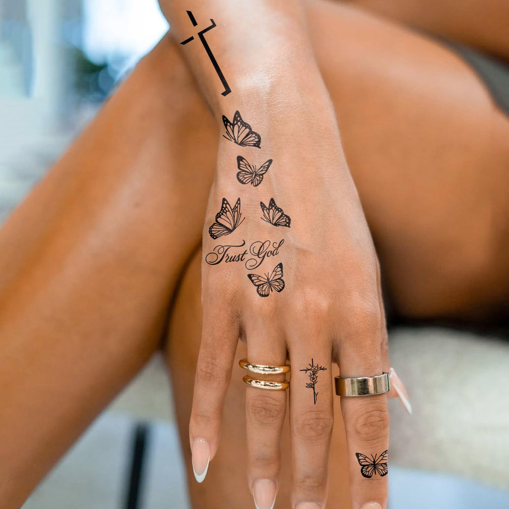 UBICA Tattoo Tech butterfly-cross closeup showing crisp black lines