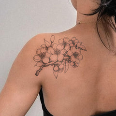 Close-up of UBICA Tattoo Tech skin-friendly botanical sticker on skin.