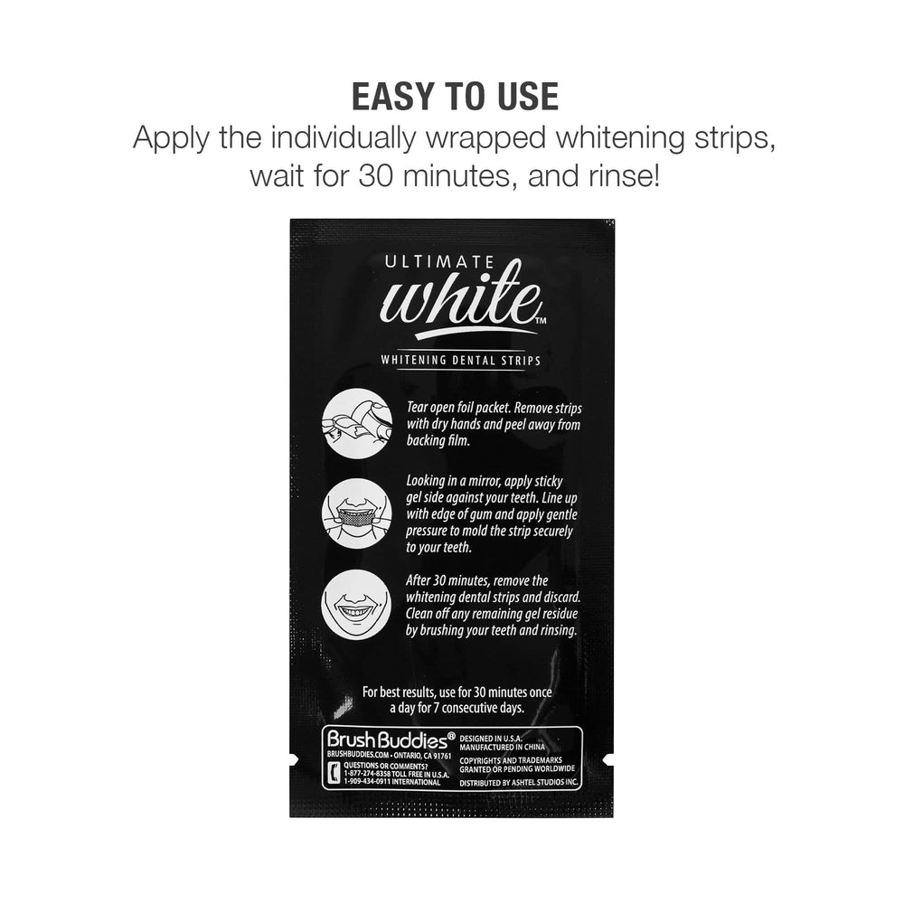 Six whitening strips laid out on white background