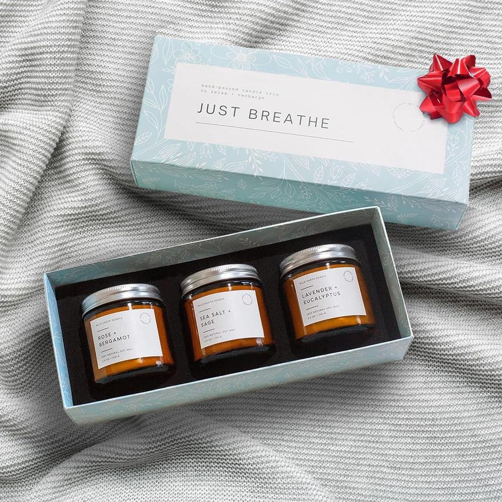 Unboxme Gifts vanilla candle in a reusable glass jar for warm comfort.