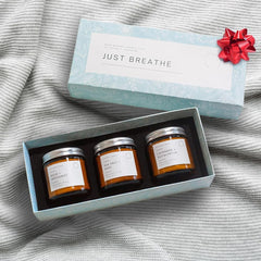 Unboxme Gifts vanilla candle in a reusable glass jar for warm comfort.