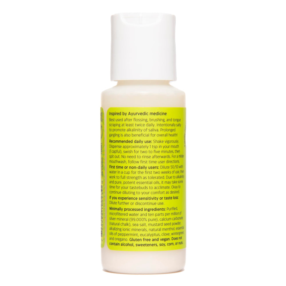 Close-up of Uncle Harry's Natural Alkalizing Miracle Mouthwash bottle and label