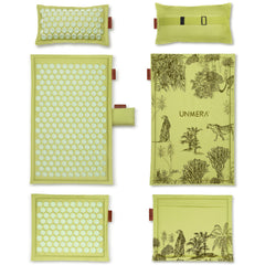 UNMERA acupressure mat and pillow set on neutral background