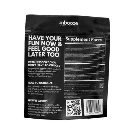 Close-up of Unbooze capsules highlighting vegan formula and nutrients