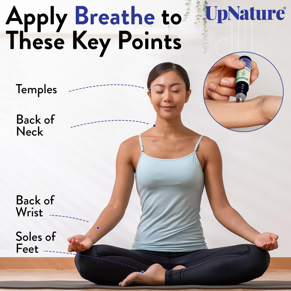 On-the-go use of UpNature Breathe roll-on for breathing support