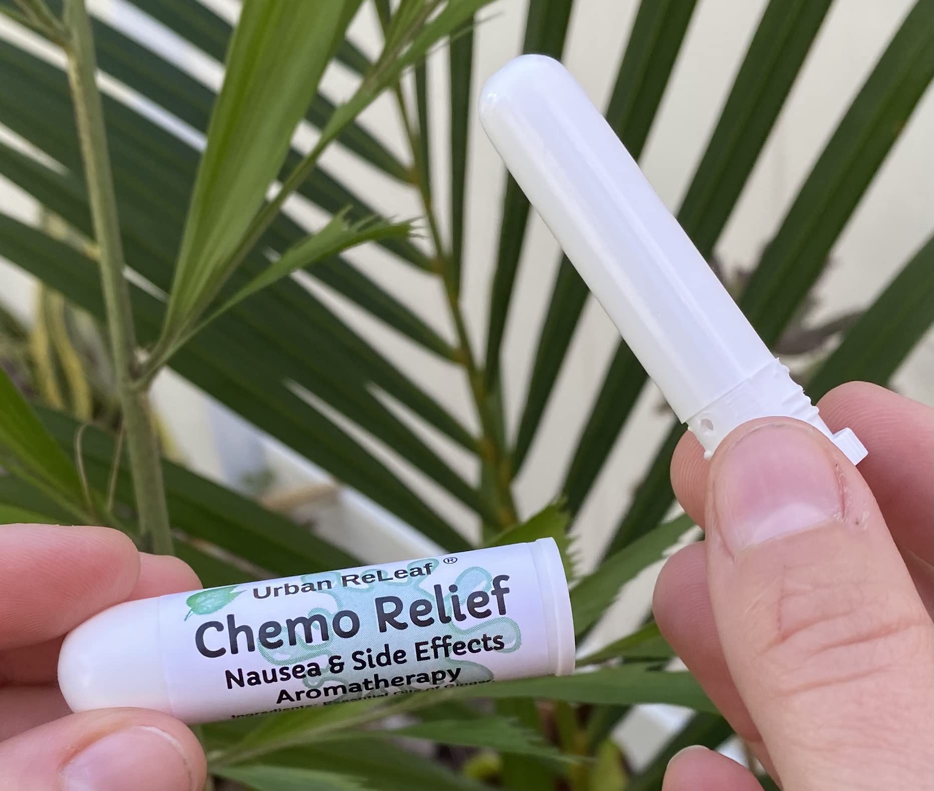 Urban ReLeaf Chemo Relief inhaler in pocket, ideal for quick use.