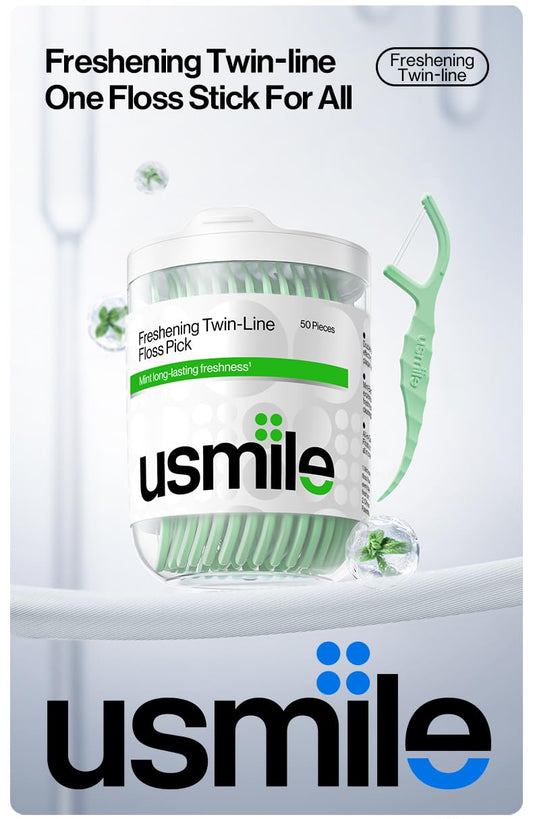 Close-up of usmile Twin-Line Floss Picks with mint fresh flavor and ergonomic grip