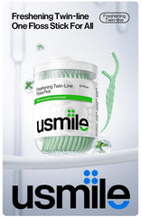 Close-up of usmile Twin-Line Floss Picks with mint fresh flavor and ergonomic grip