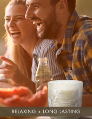 Candle with wood lid on a glass jar