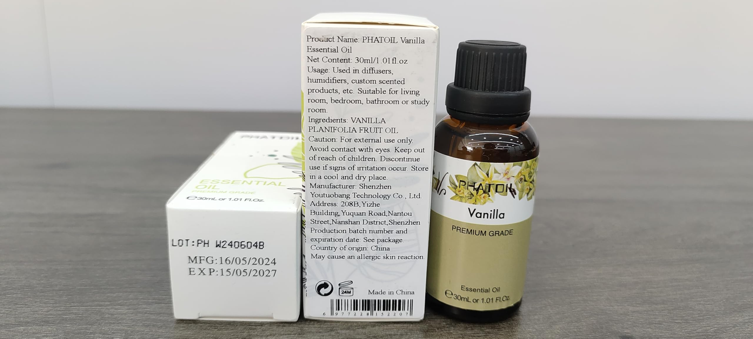 Close-up of vanilla essential oil label and dropper
