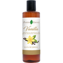 Bottle of vanilla massage oil on a white background
