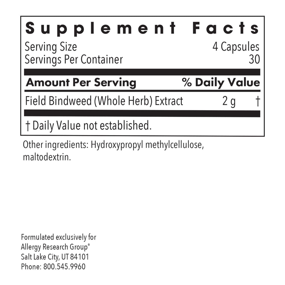 Close-up of VascuStatin Formula capsules poured from bottle