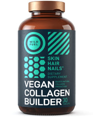 Product packaging and pills arranged on a wooden surface