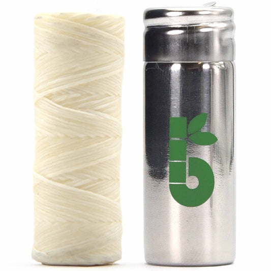 Vegan dental floss in a refillable stainless steel dispenser