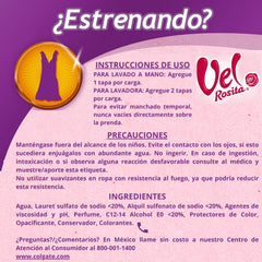Pouring Vel Rosita Delicada detergent into a washing load