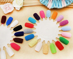 Color palette spread shows vibrant shades for festive nail art.
