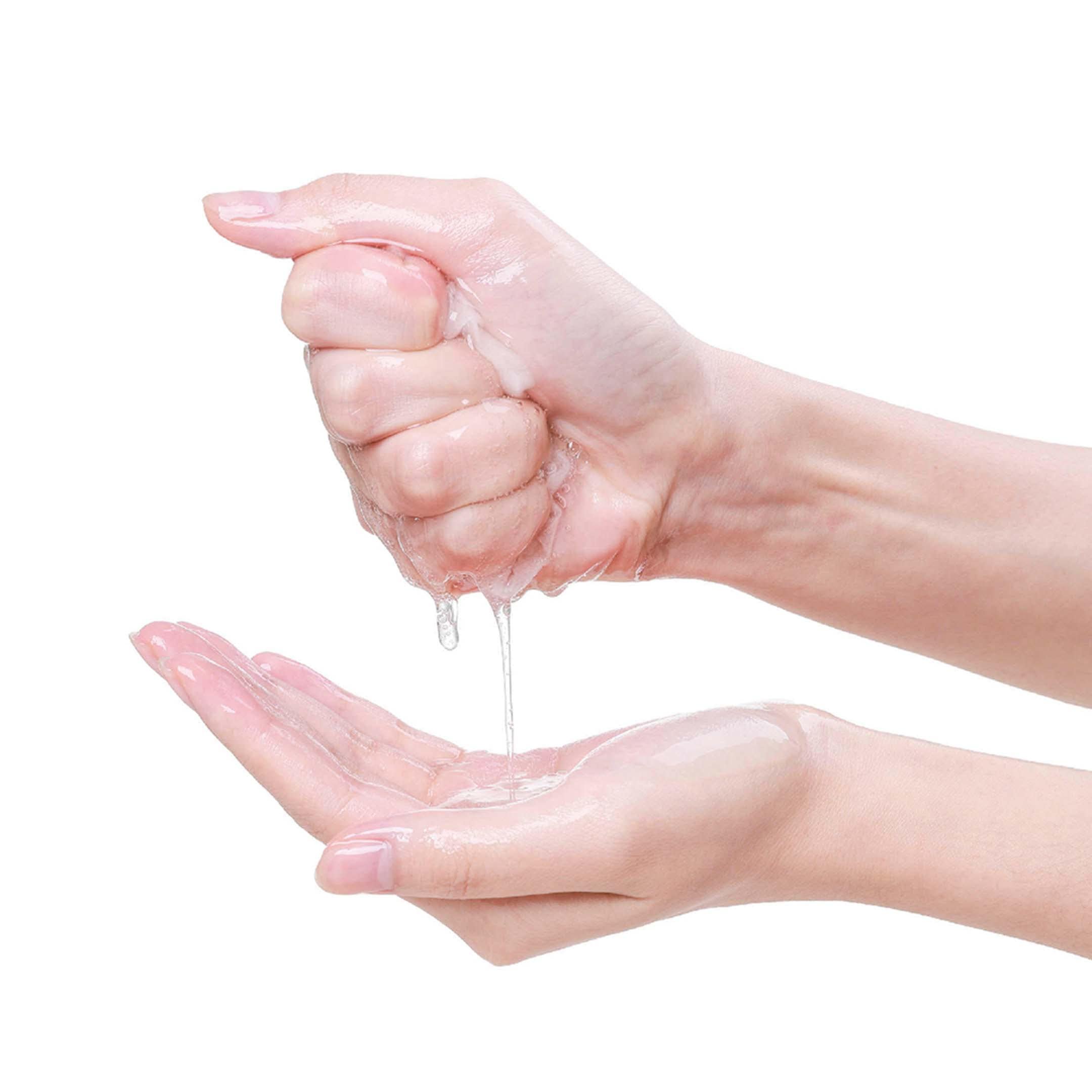 Applying Veraclara mask with hands for refresh.