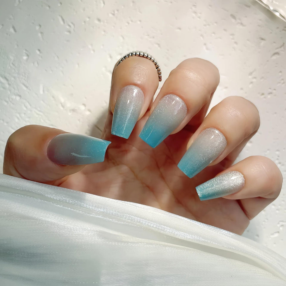 Wear vesweet mint green cat eye nails day to night versatility.