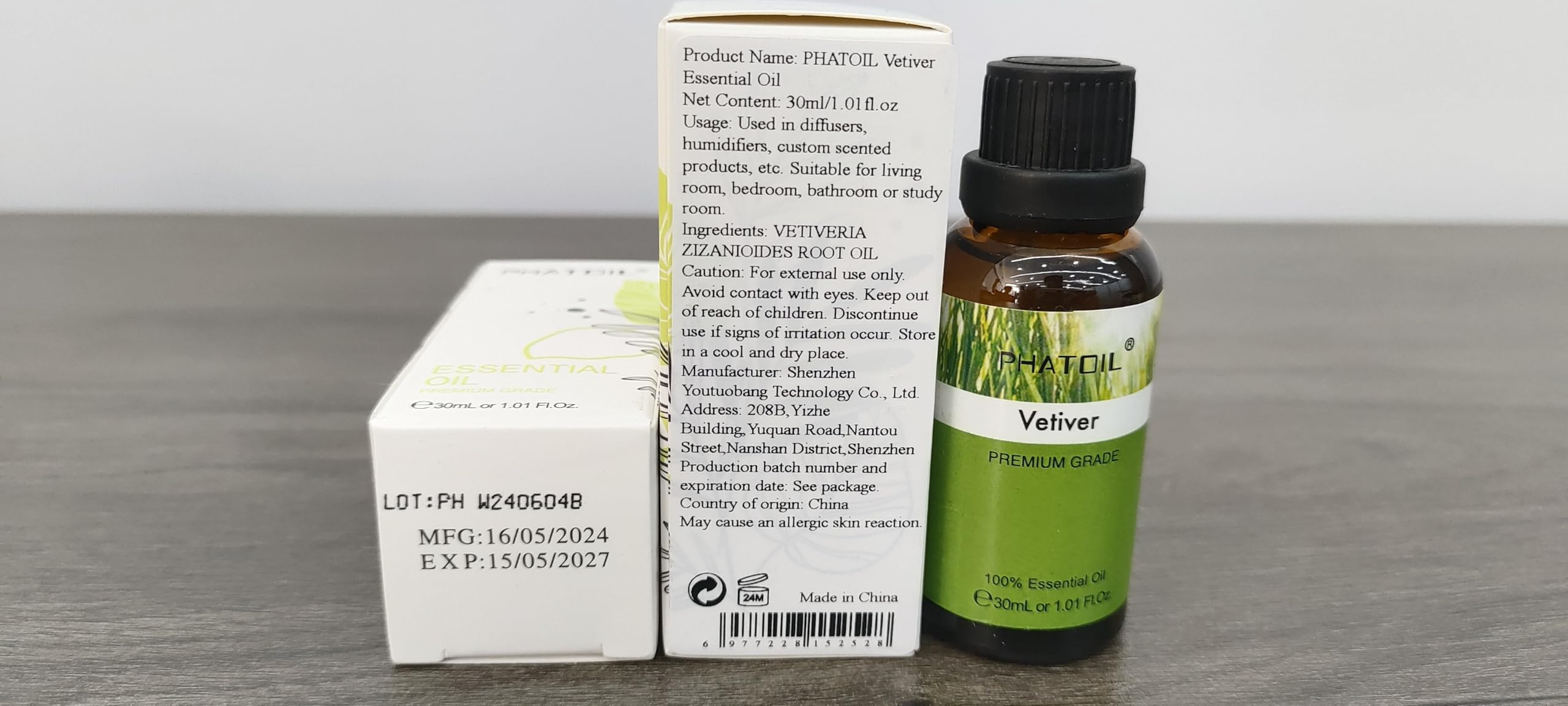 Flat lay of Vetiver essential oil with natural ingredients