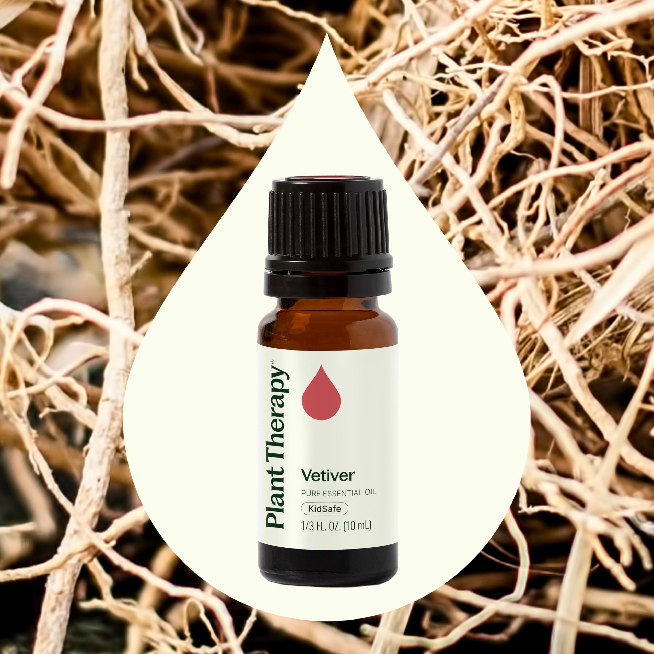 Vetiver essential oil bottle against white background