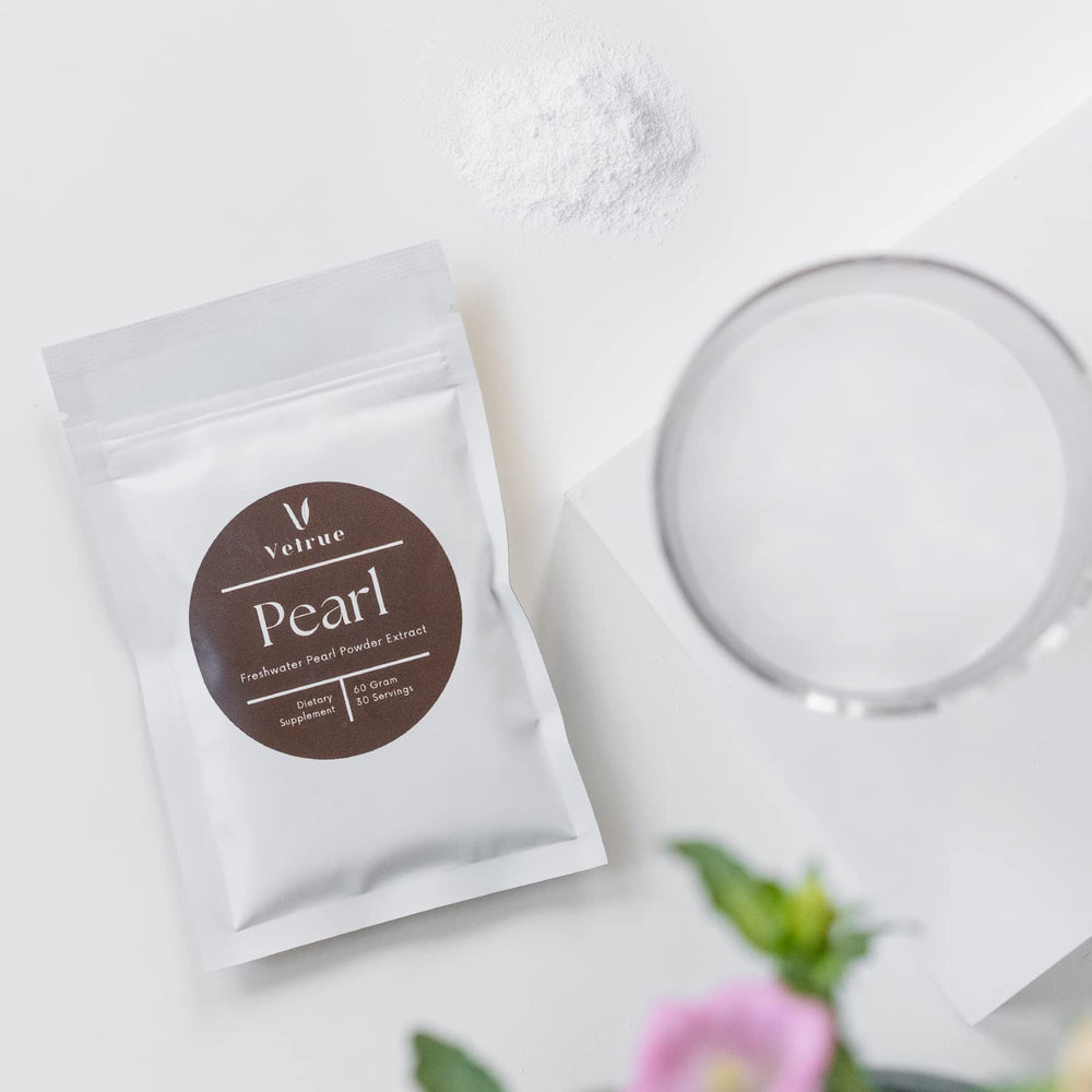 Pearl powder shown with skincare cream for topical use