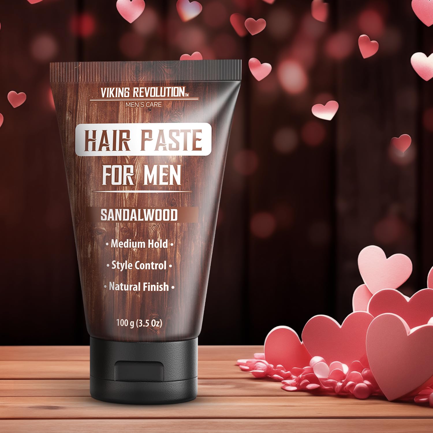 Viking Revolution Hair Paste hands applying the product for medium-hold styling.