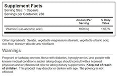 Close-up of Vitacost Vitamin C 1000 mg bottle with capsules