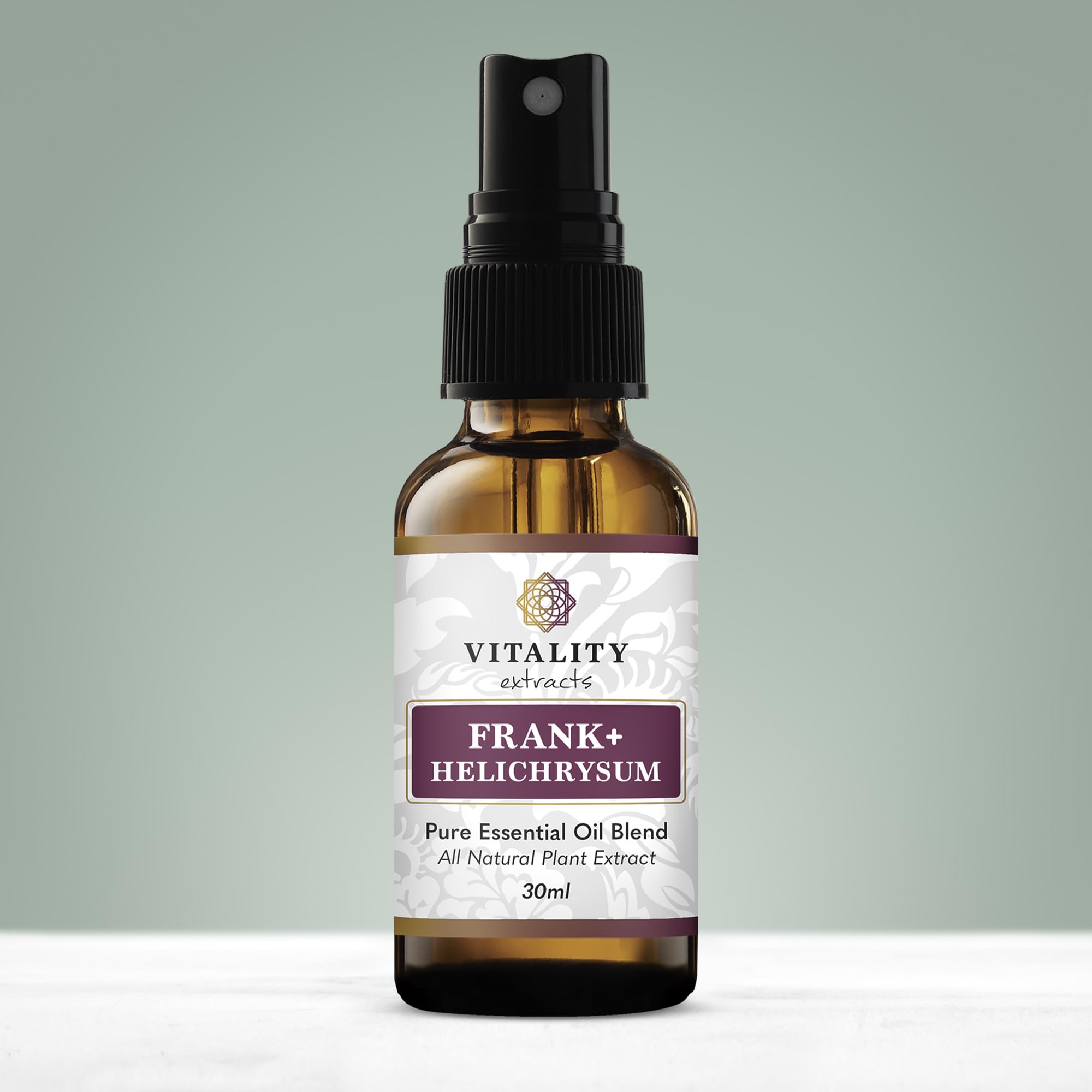 Close-up of essential oil spray bottle label with Frankincense and Helichrysum