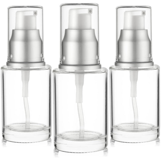 VitalUp clear glass bottle with silver cap showcases premium cosmetic display.
