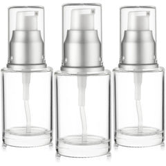 VitalUp clear glass bottle with silver cap showcases premium cosmetic display.