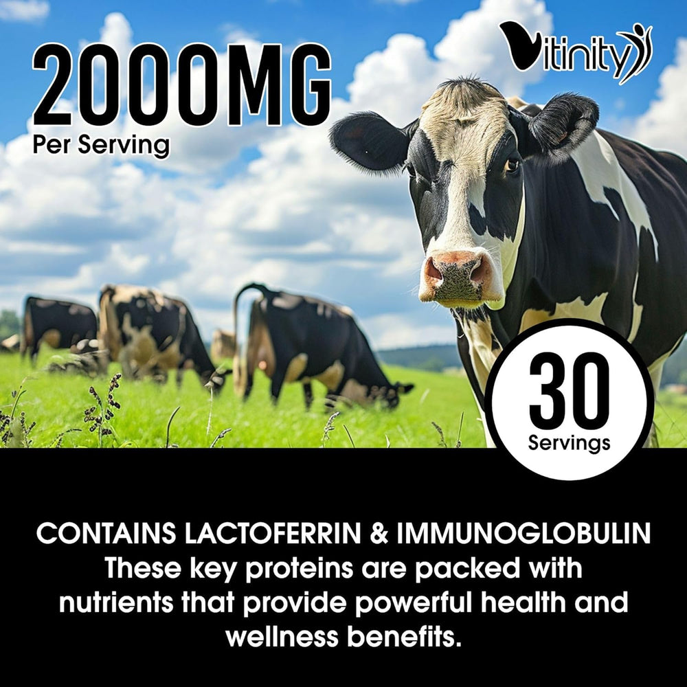 Serving scoop of colostrum powder next to capsules