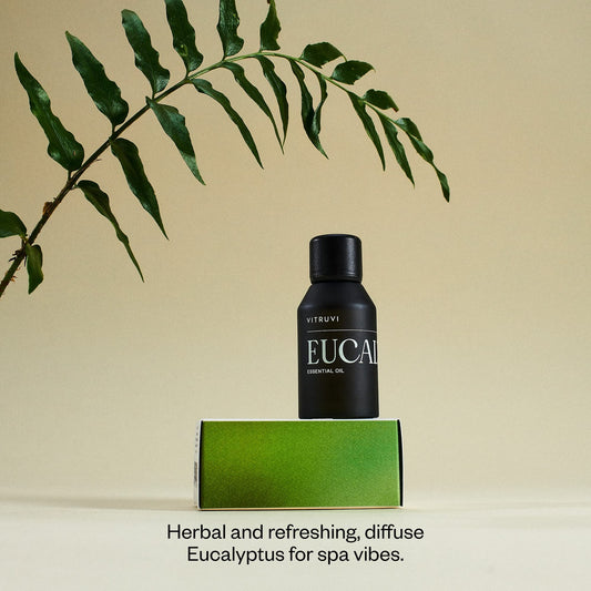 Side view of Vitruvi Eucalyptus essential oil bottle