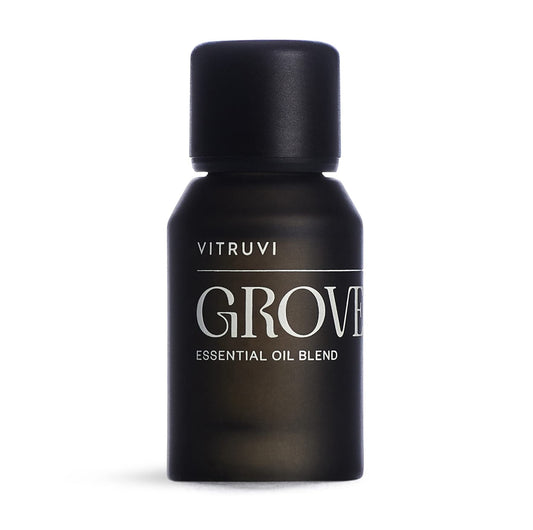 Vitruvi Grove grounding essential oil blend bottle front view (0.5 fl oz)