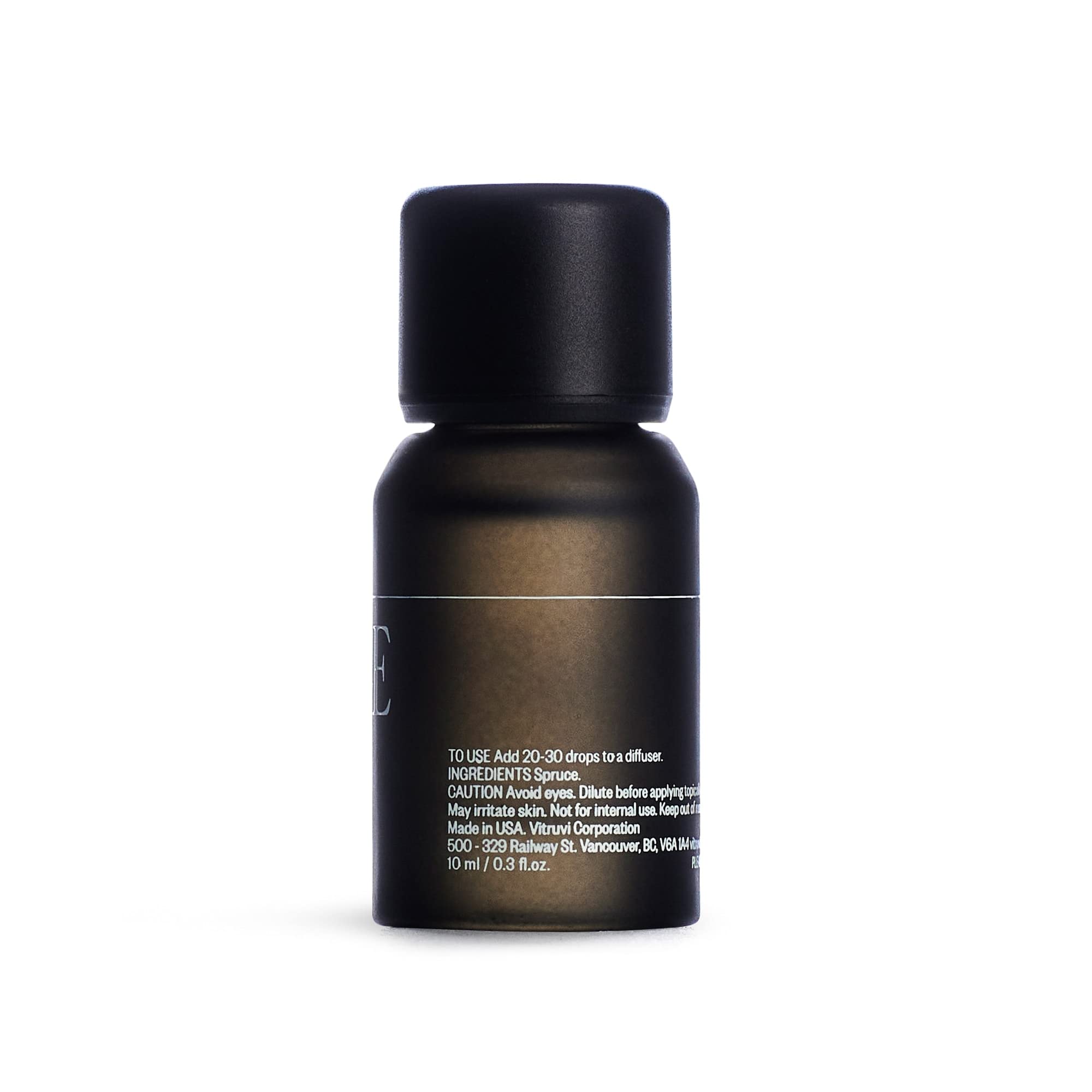 Spruce essential oil bottle packaging and labeling