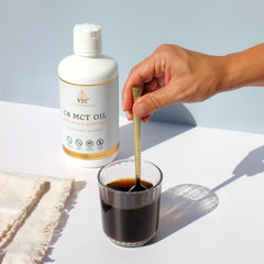 VTC VitaTradingCo measuring-spoon scene with Pure C8 MCT Oil for precise servings