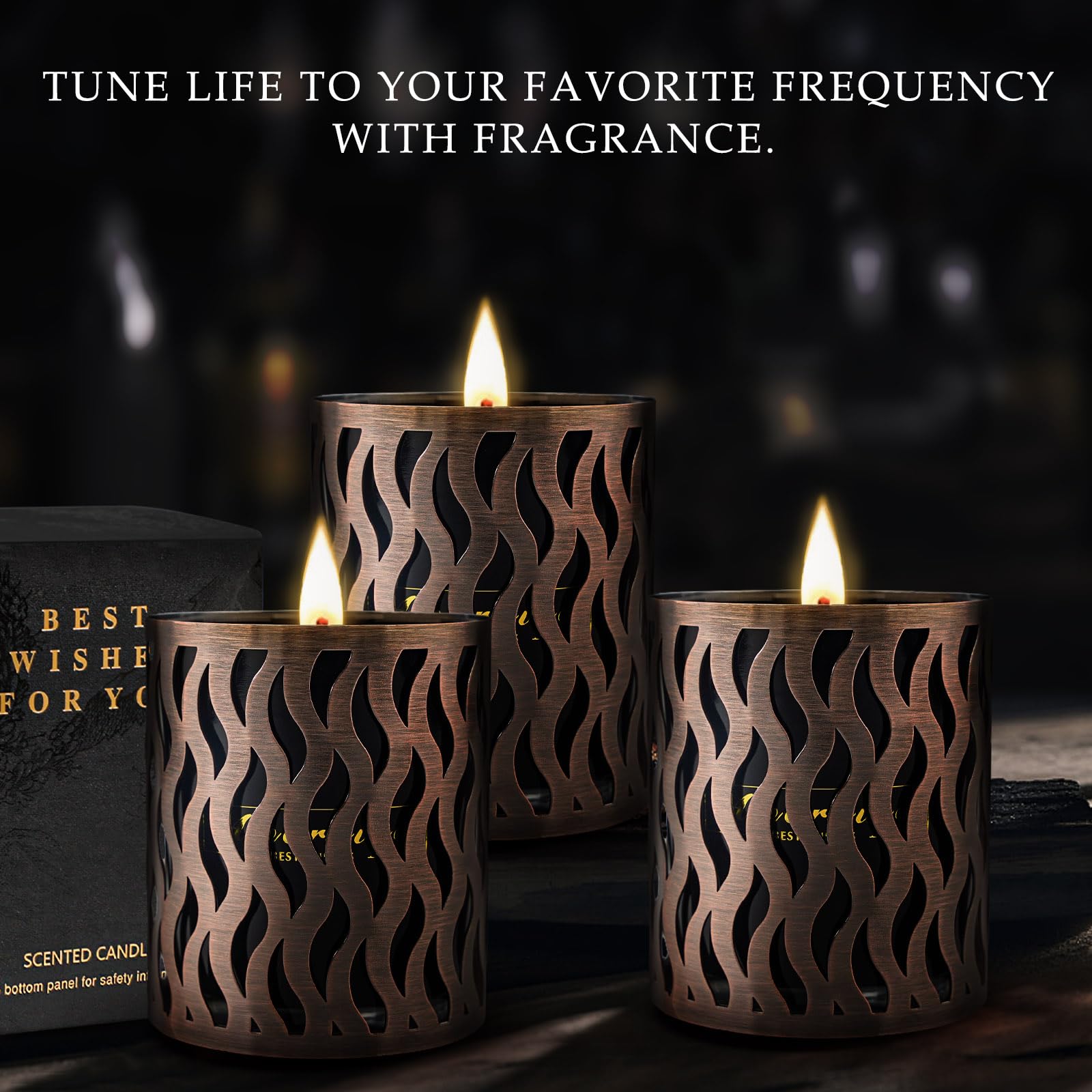 Warm amber scented candle in black jar