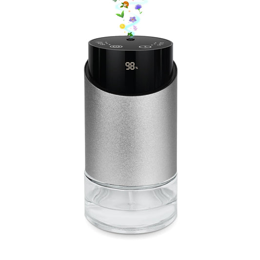 Waterless essential oil diffuser with cylindrical metal body and glass base.