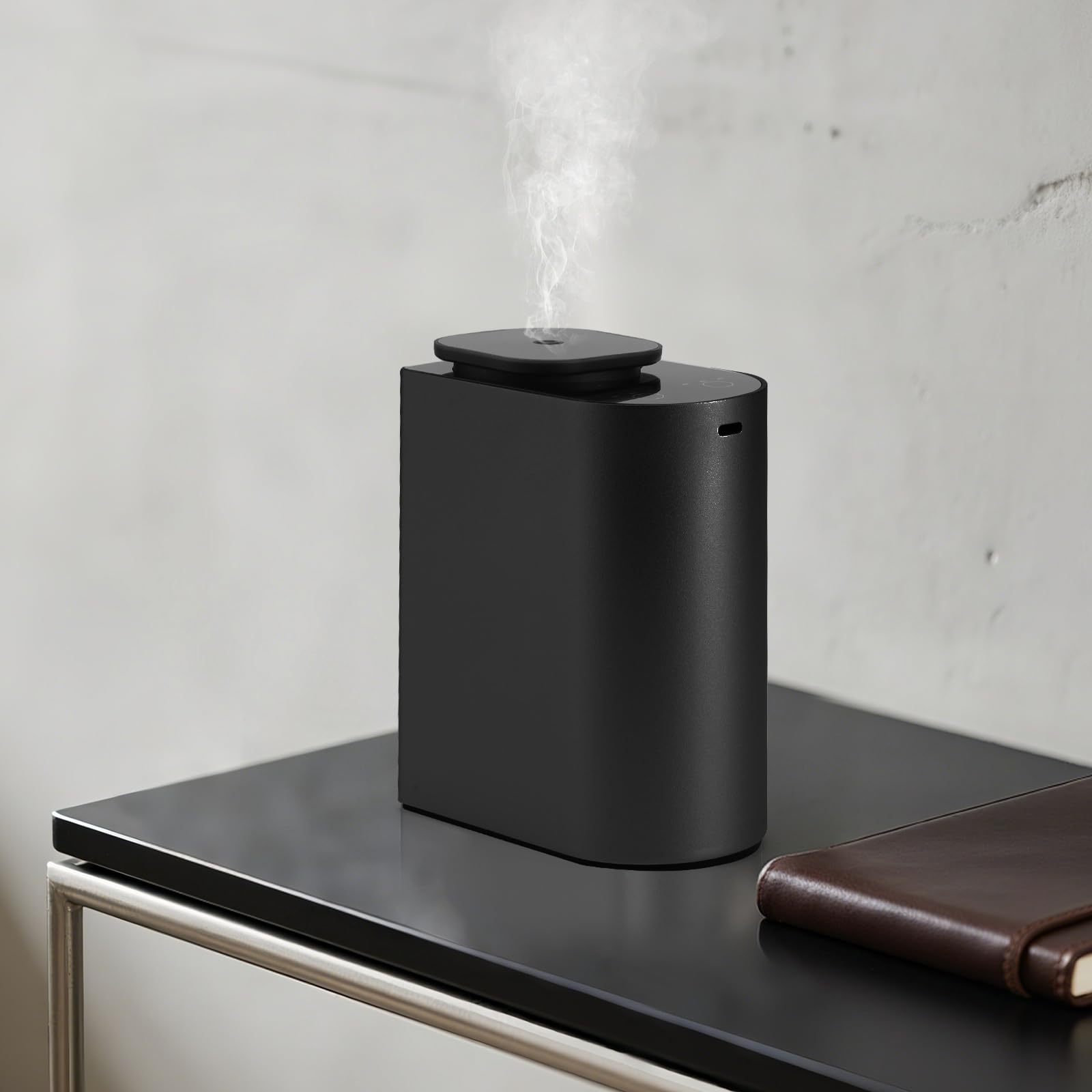 Diffuser projecting fragrance across a large room up to 1000 sq ft