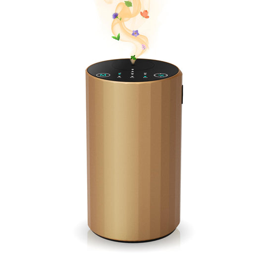 Golden waterless essential oil diffuser on a white desk