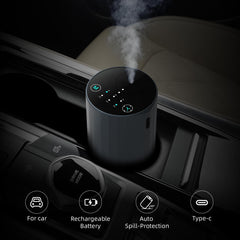 Lifestyle shot of the grey waterless diffuser in a living room