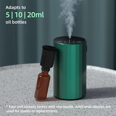 Office desk setup with waterless essential oil diffuser